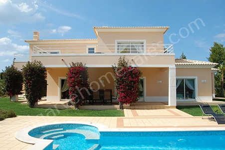 Villa with bougainvillea and pool