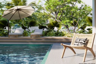 Chair by a pool with umbrella and loungers