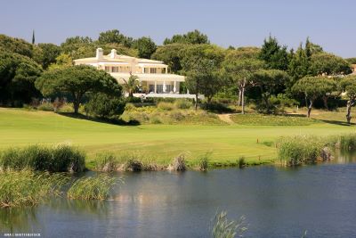 Large villa on a hill overlooking a fairway