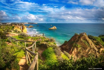 View of cliff walk , rock formations and beach at Praia da Rocha, Portimão