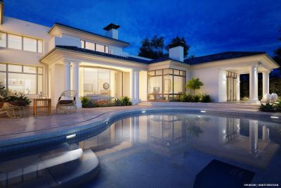 Luxury villa with pool at dusk