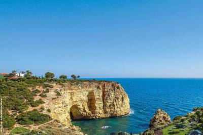 View out to see over a peninsula with a villa