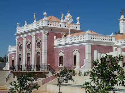 Pink Palace in Estoi with gardens in the forefront