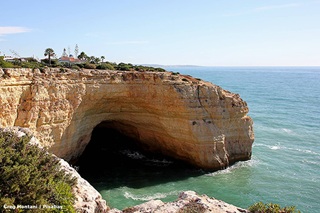 Property on cliff with cave and sea views