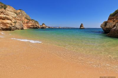 Beach with ocean and rock formations