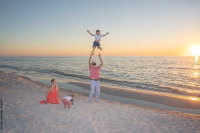 Family playing on a beach